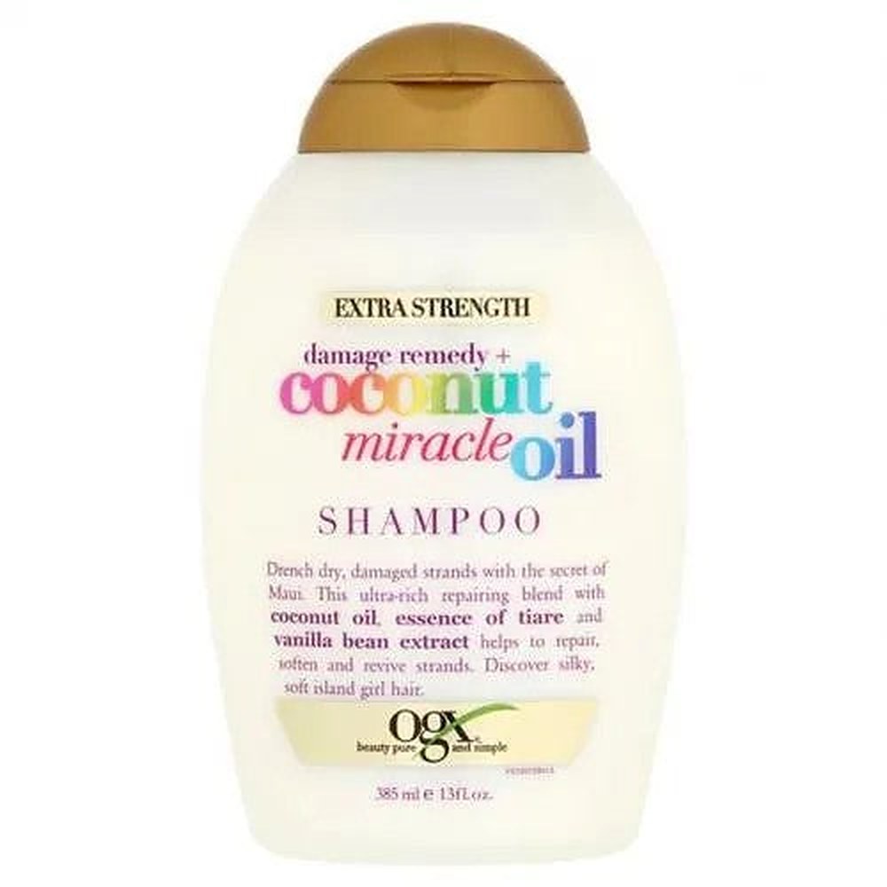 OGX Coconut Miracle Oil Vahvistava shampoo vaurioituneille hiuksille kookosöljyllä 385 ml