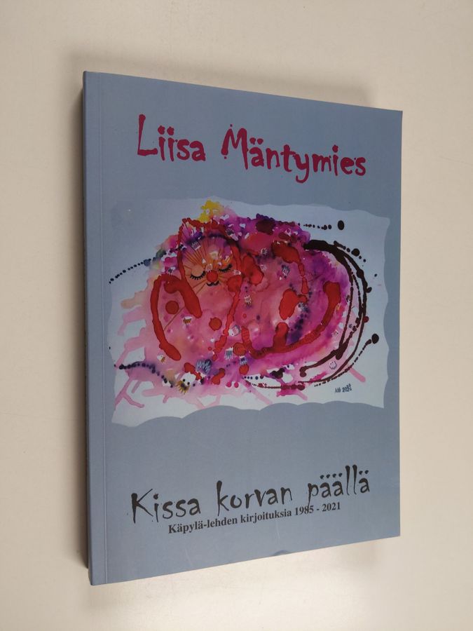 Kissa korvan päällä