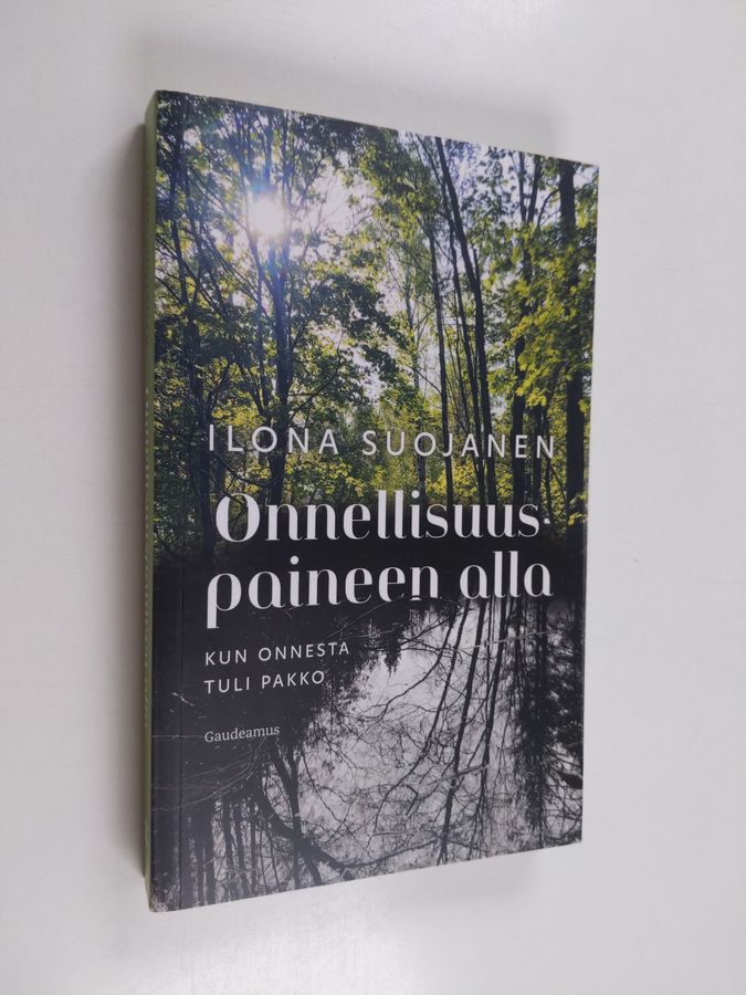 Onnellisuuspaineen alla