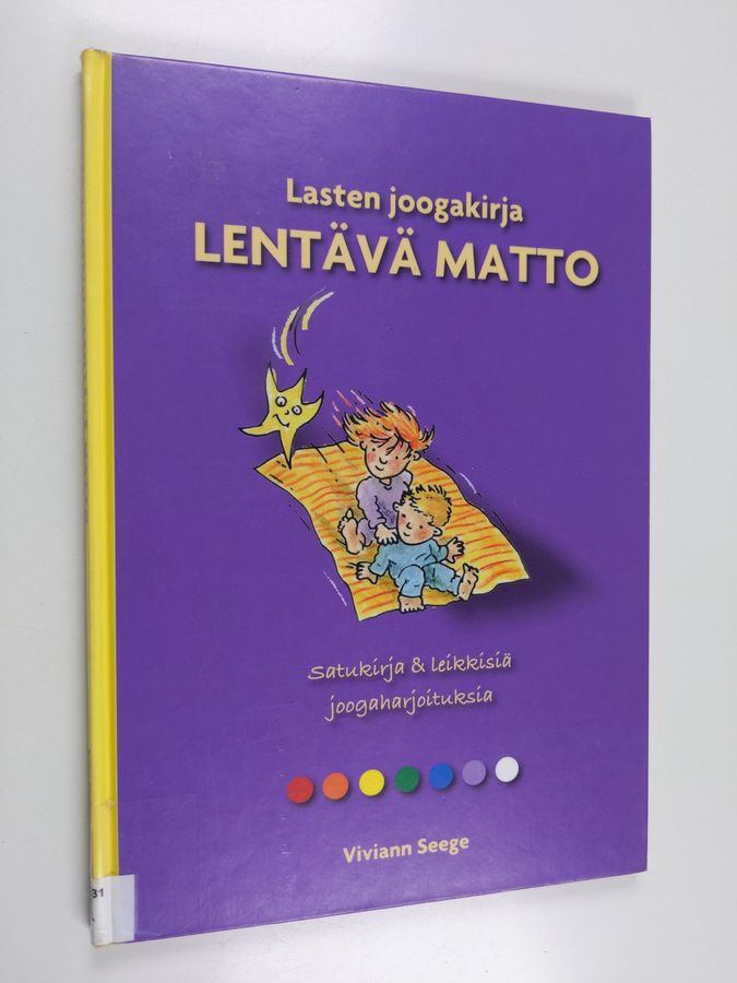 Lasten joogakirja lentävä matto