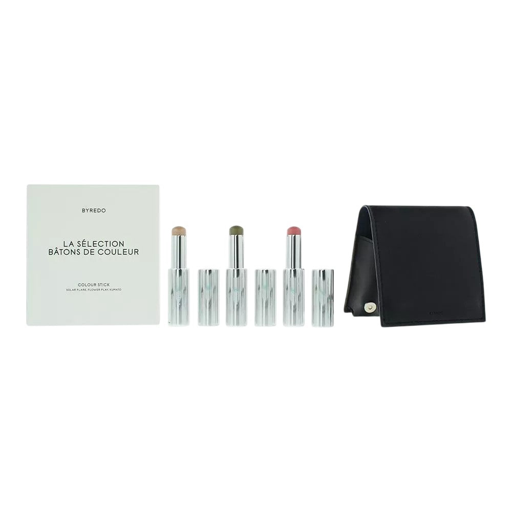 Tummansininen setti Byredo: Luomiväri 509 Solar Flare 3,5 g + Luomiväri Kumato Face 3,5 g + Luomiväripuikko Flower Play 3,5 g + Nahkakotelo
